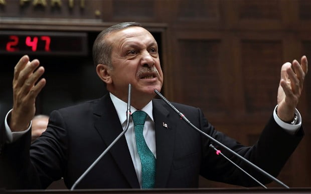 Turkey's Prime Minister Recep Tayyip Erdogan addresses his supporters at the parliament in Ankara, Turkey / Photo: AP