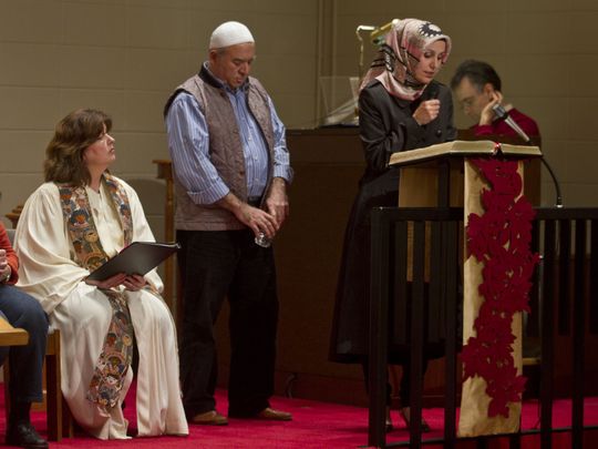 Fatma Kiline of Peace Islands Institute speaks to those gathered at the church. The Lincroft Presbyterian Church hosts the Bayshore Ministerium Interfaith Thanksgiving Service with the idea that bringing people of different faiths together will make the world a better place. Lincroft, NJ Tuesday, November 24, 2015 @dhoodhood  (Photo: Doug Hood/Staff Photographer)