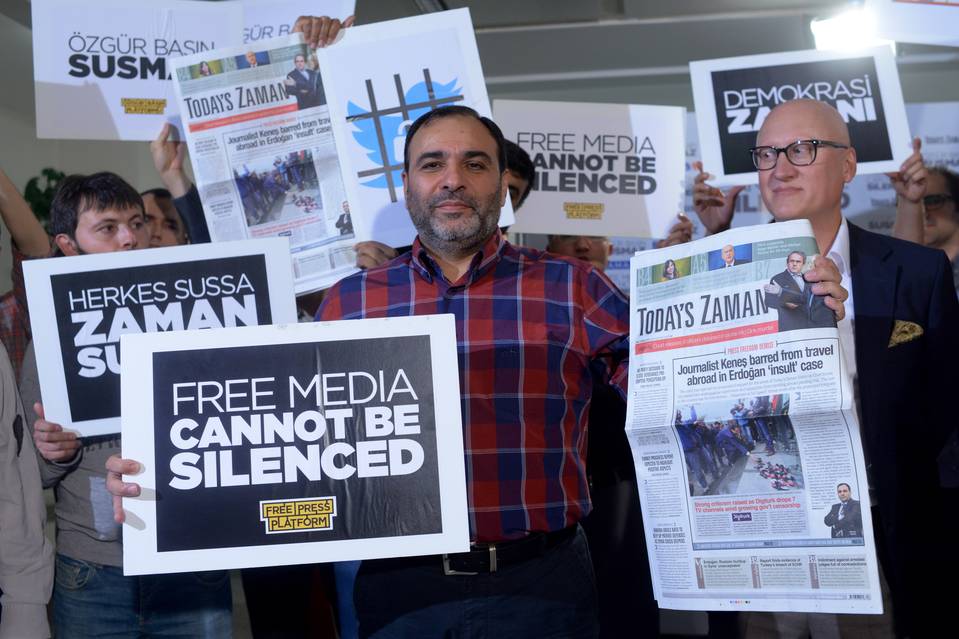 Bulent Kenes, at the time the editor of Today’s Zaman, shows off his newspaper in Istanbul on Oct. 9, 2015.