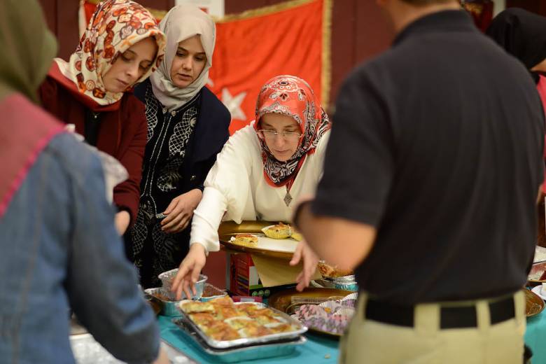 Women stop by the Turkish Cultural Center at the festival at Clifton High School on Saturday, Oct. 15, 2016. Photo: Carmine Galosso