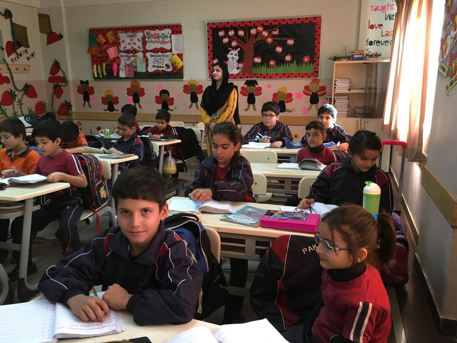 A second-grade English class at the PakTurk International School in Peshawar, Pakistan, is temporarily being taught by Pakistani teachers because the regular Turkish teachers are being told to leave the country. (Pam Constable/The Washington Post)