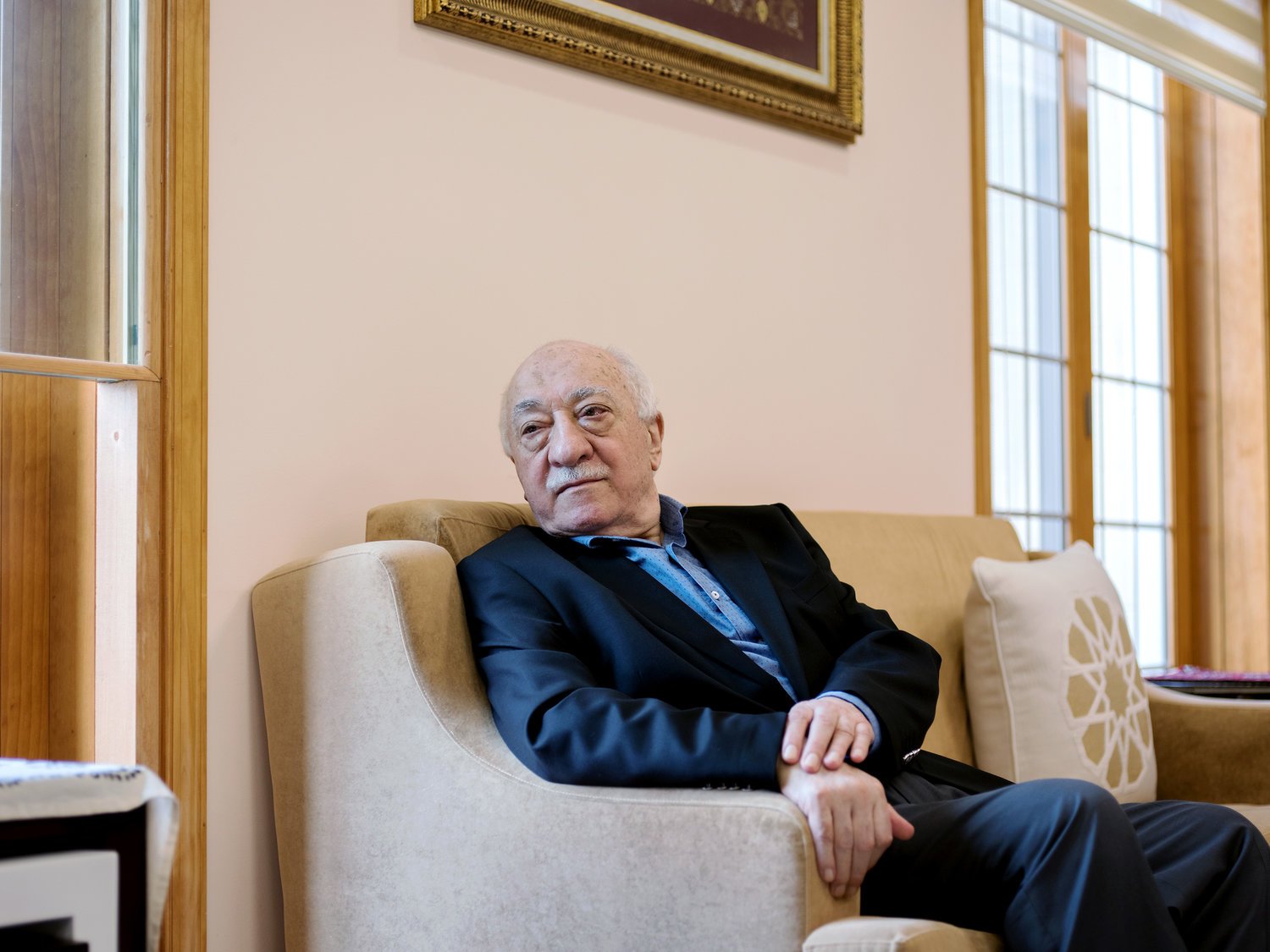 Fethullah Gulen sits in a room at his compound in Saylorsburg, Pennsylvania. He has lived in exile in the United States since the late 1990s. Turkish President Recep Tayyip Erdogan blames Gulen for last year's failed coup and is seeking his extradition.
Bryan Thomas for NPR